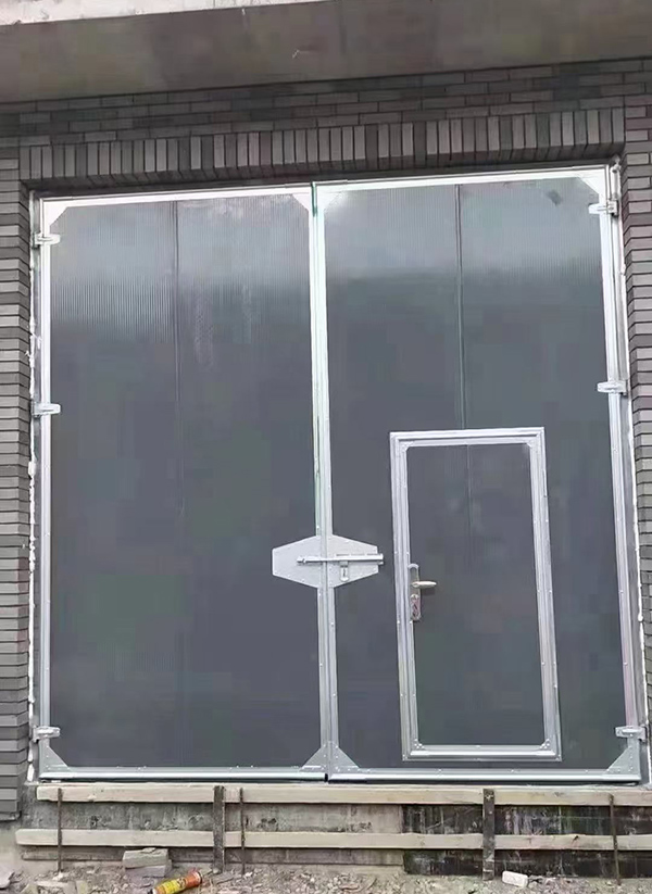 礼县工业平开门在大型设备制造车间的应用实例